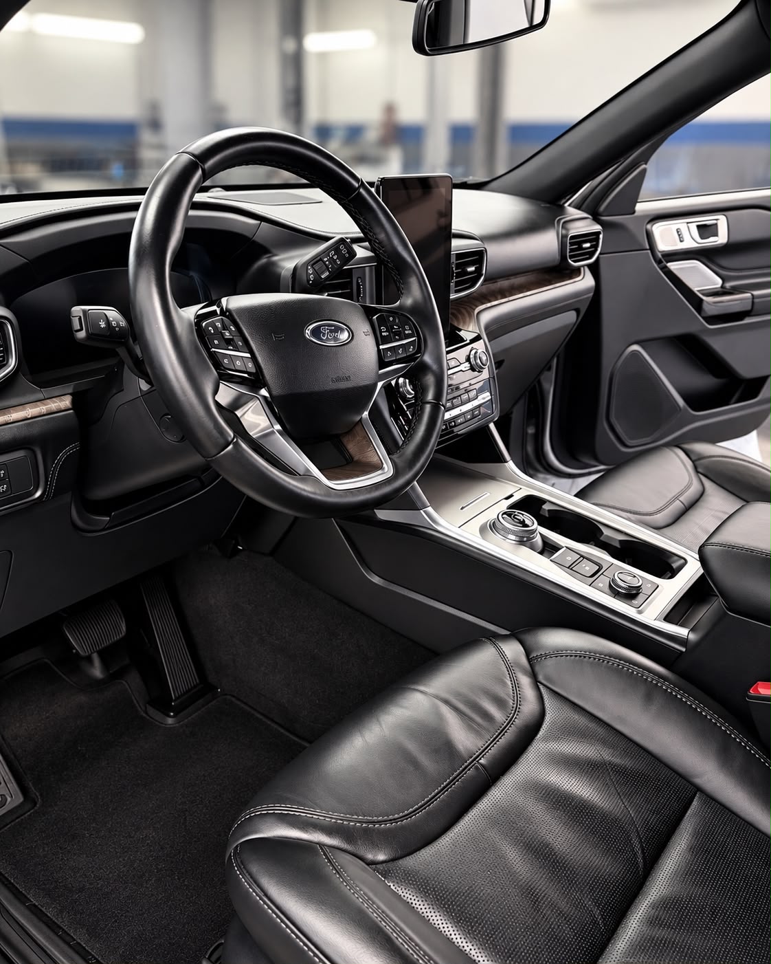 Ford interior with clean leather seats and center console
