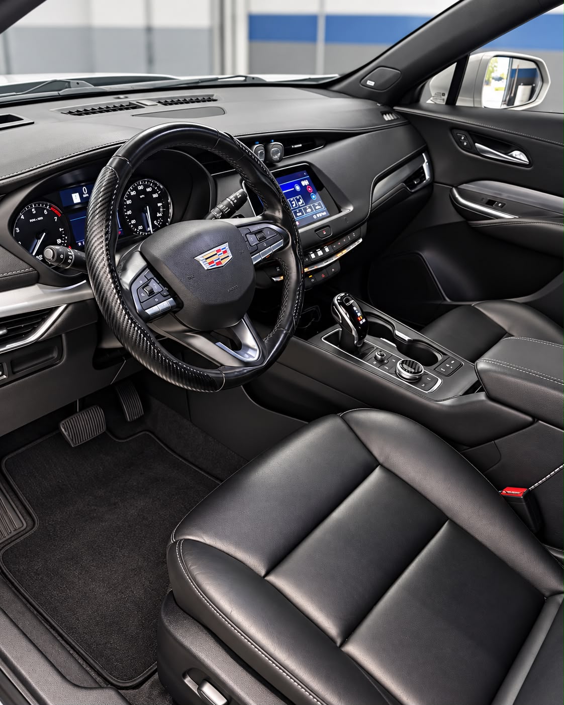 Cadillac interior with detailed dashboard and leather upholstery